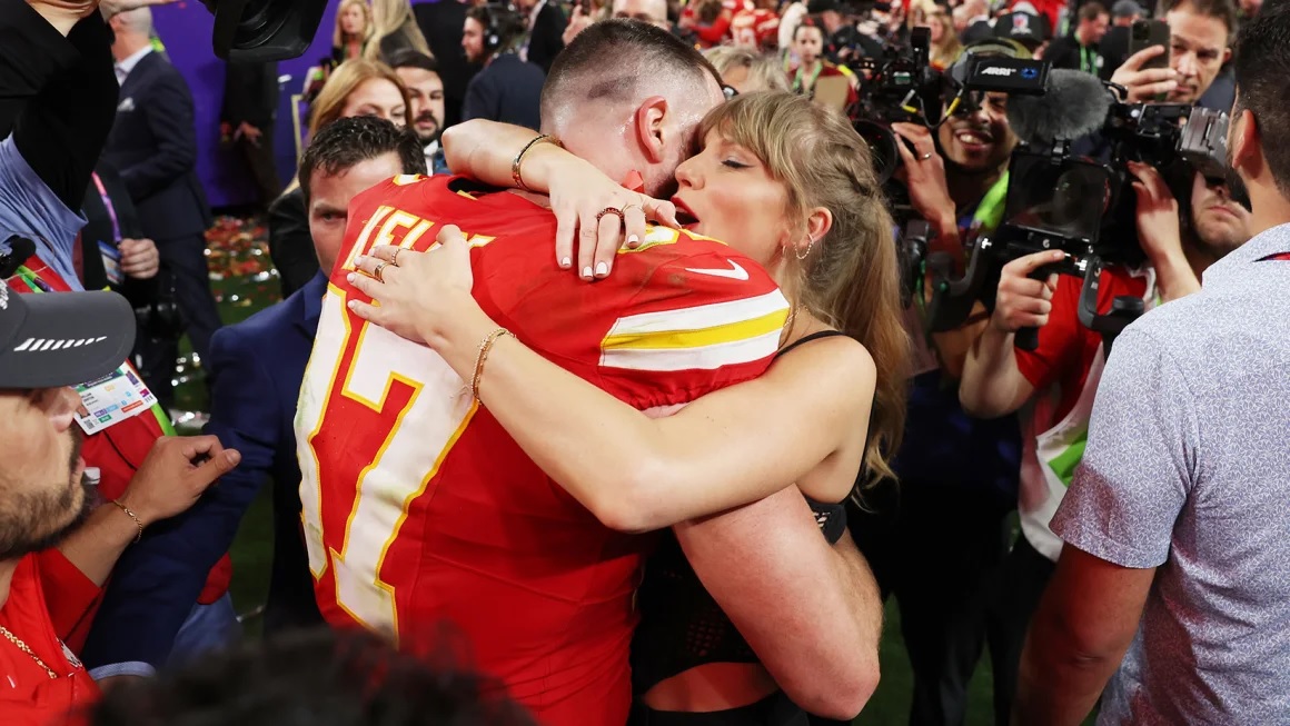 Travis Kelce of Kansas City Chiefs and Taylor Swift embrace after defeating the San Francisco 49ers in overtime during Super Bowl LVIII